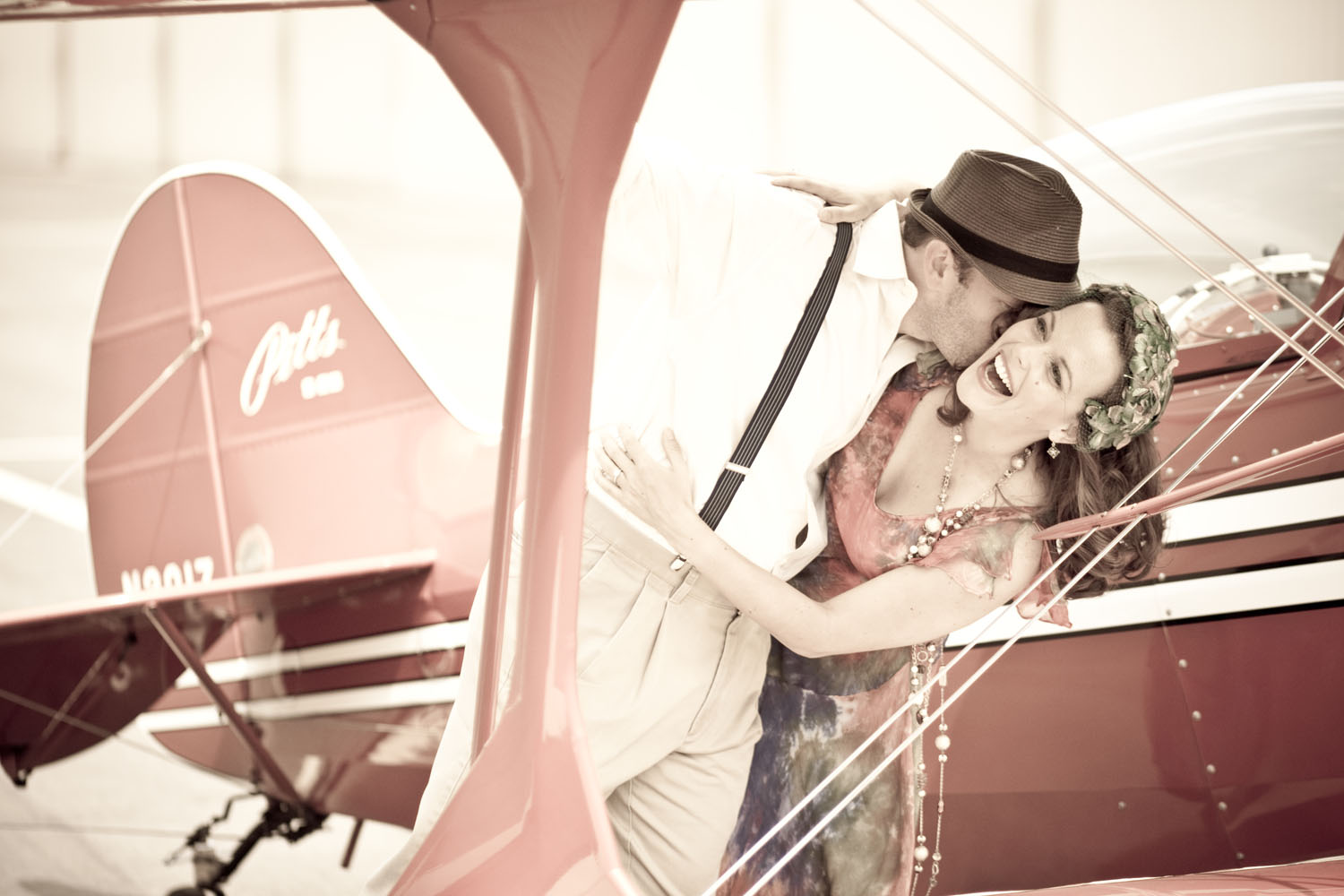 This was taken during a 1930's-era aviation-themed photo shoot at John Wayne Airport with my Pitts S-2B biplane