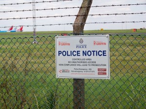 Is there anything less inviting than a barbed wire fence plastered with warning signs?