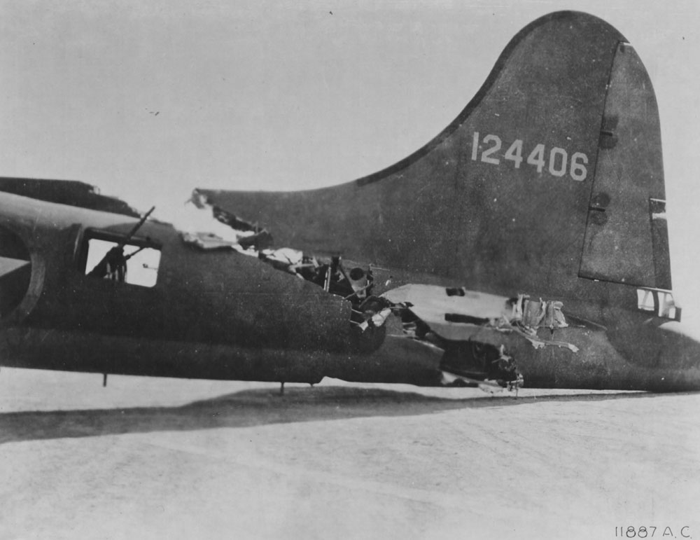 Mid-airs are nothing new.  This B-17 collided with a German fighter over Tunisia in 1943.