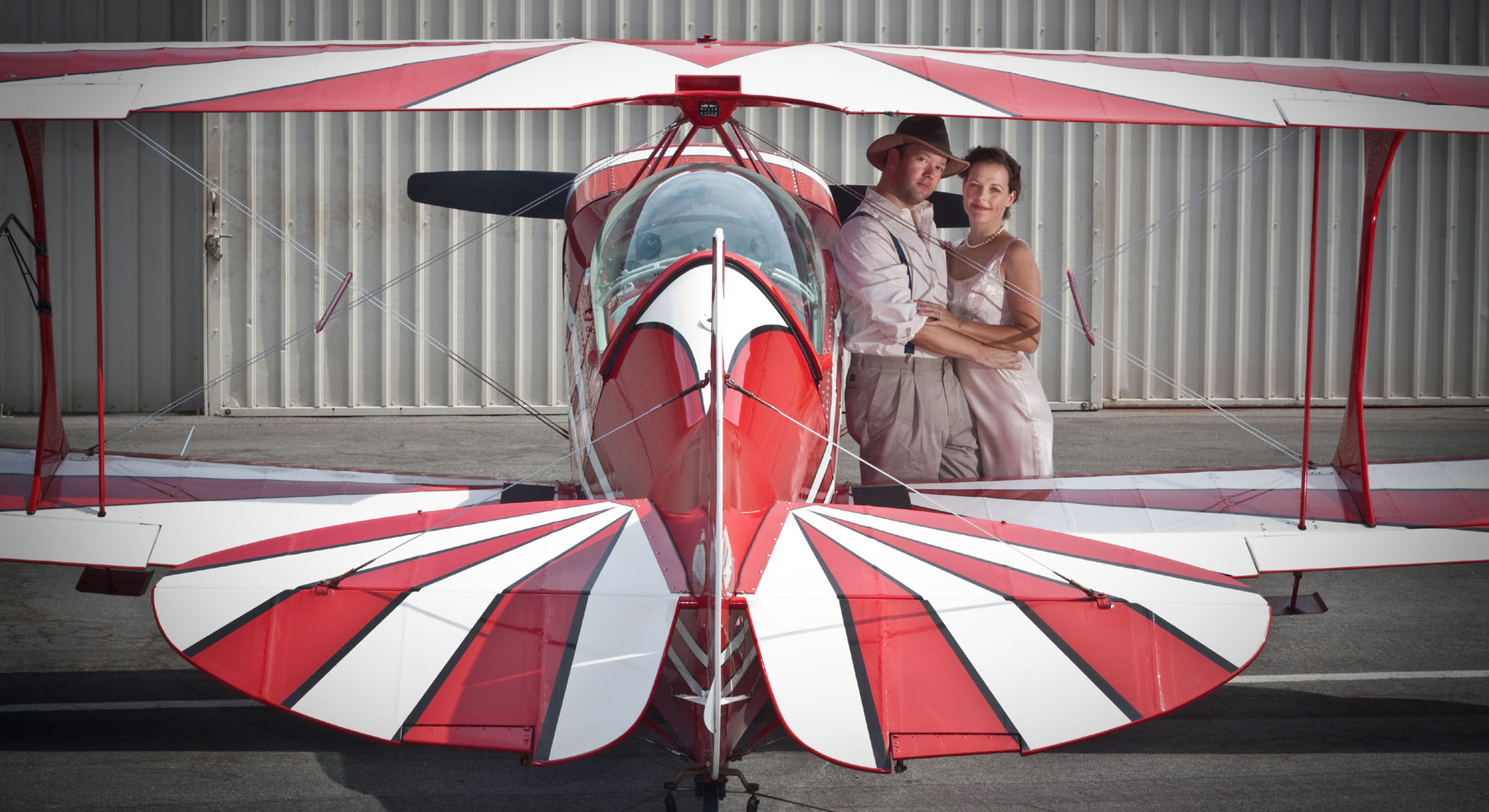 A 1930's-era aviation-themed photo shoot at John Wayne Airport with my wife and our Pitts S-2B biplane