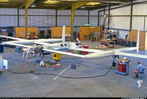 The famous Rutan Voyager in the hangar.  Note the composite MT Propeller assemblies on the front and rear engines.  They were replaced a few months later with metal props after losing a blade in flight.